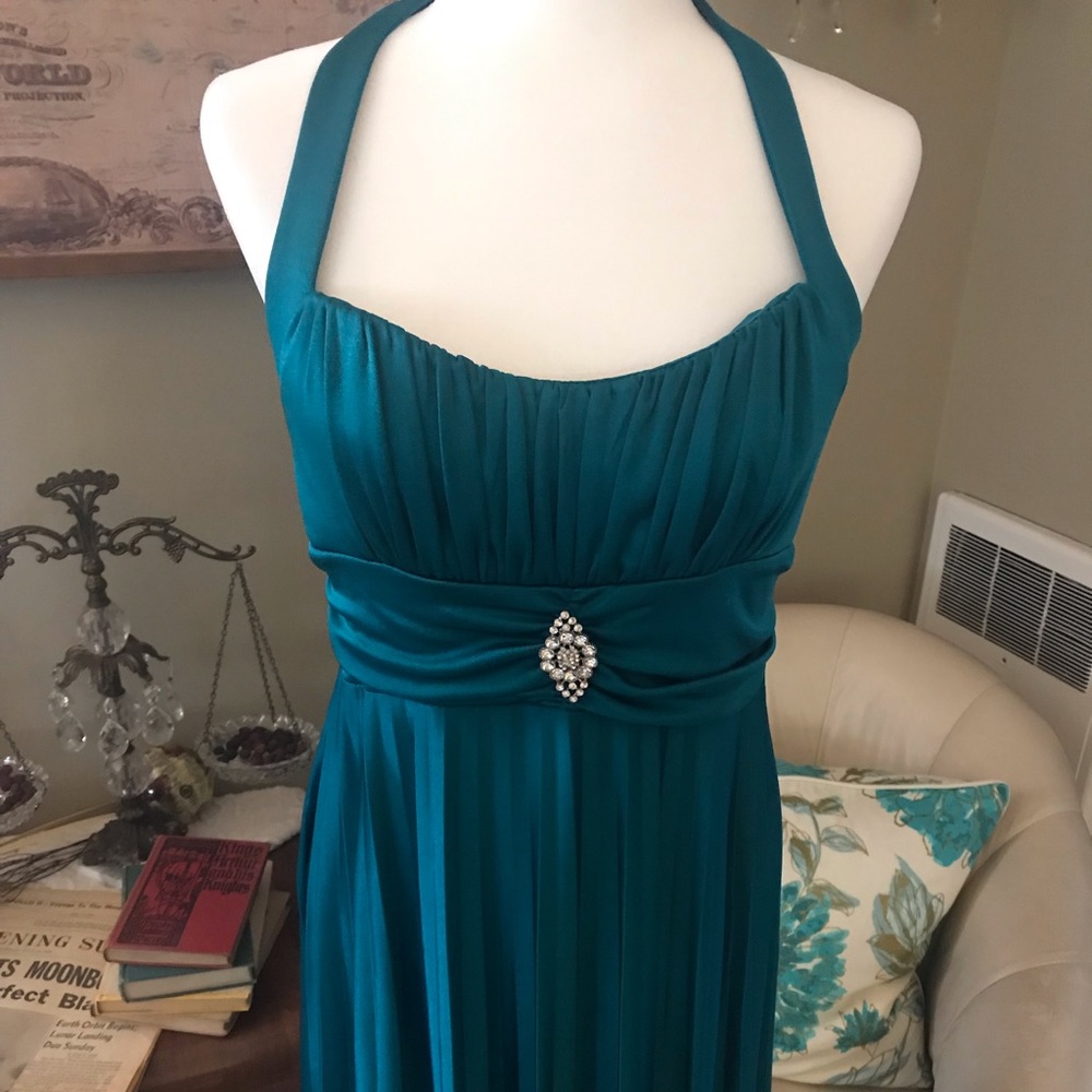 Emerald green pleated cocktail dress